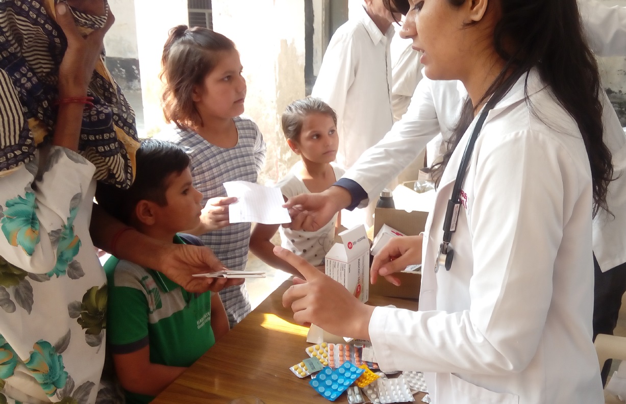 Doctors and volunteers conducting a medical camp